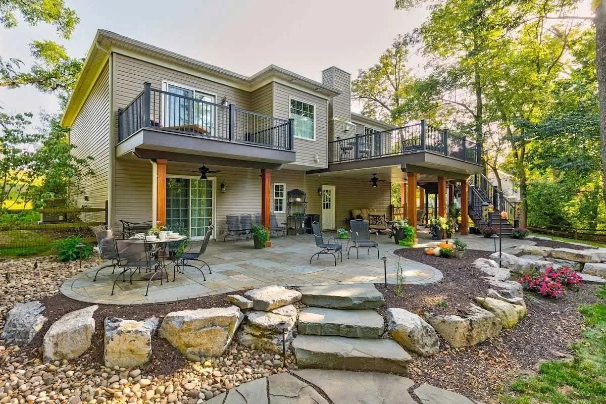Flagstone patio boulder steps walkout deck river rock.38e22390