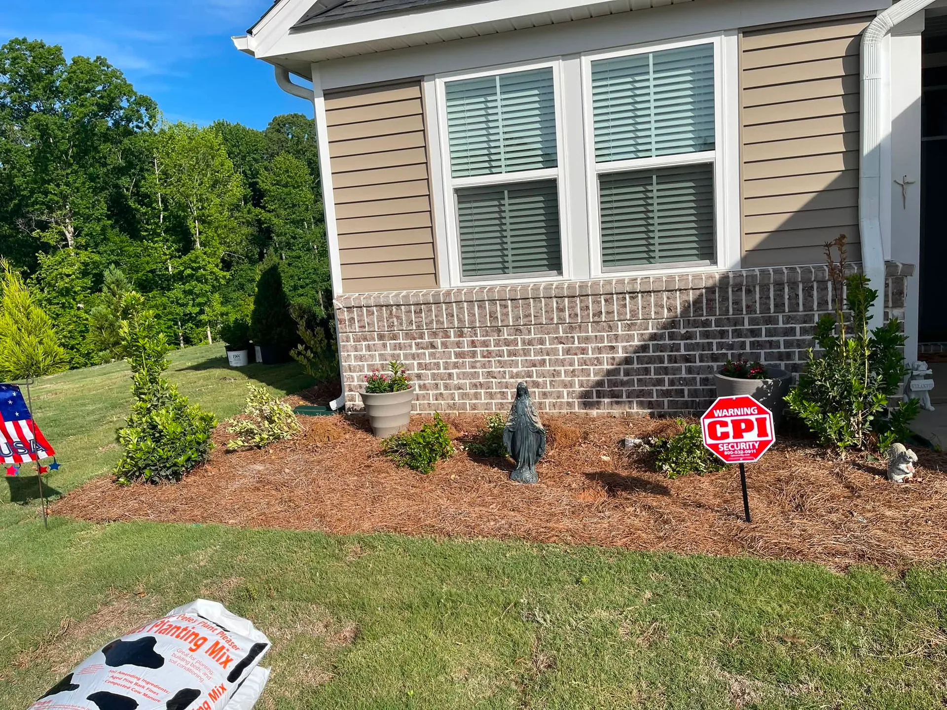 Pine straw foundation bed garden statue upstate sc.c60b1988