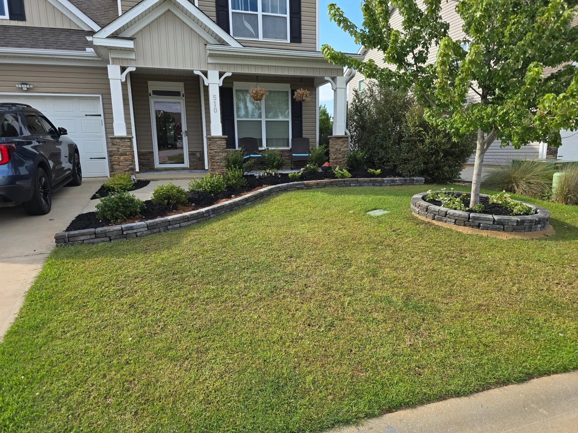 Stone tree ring curved front bed upstate SC