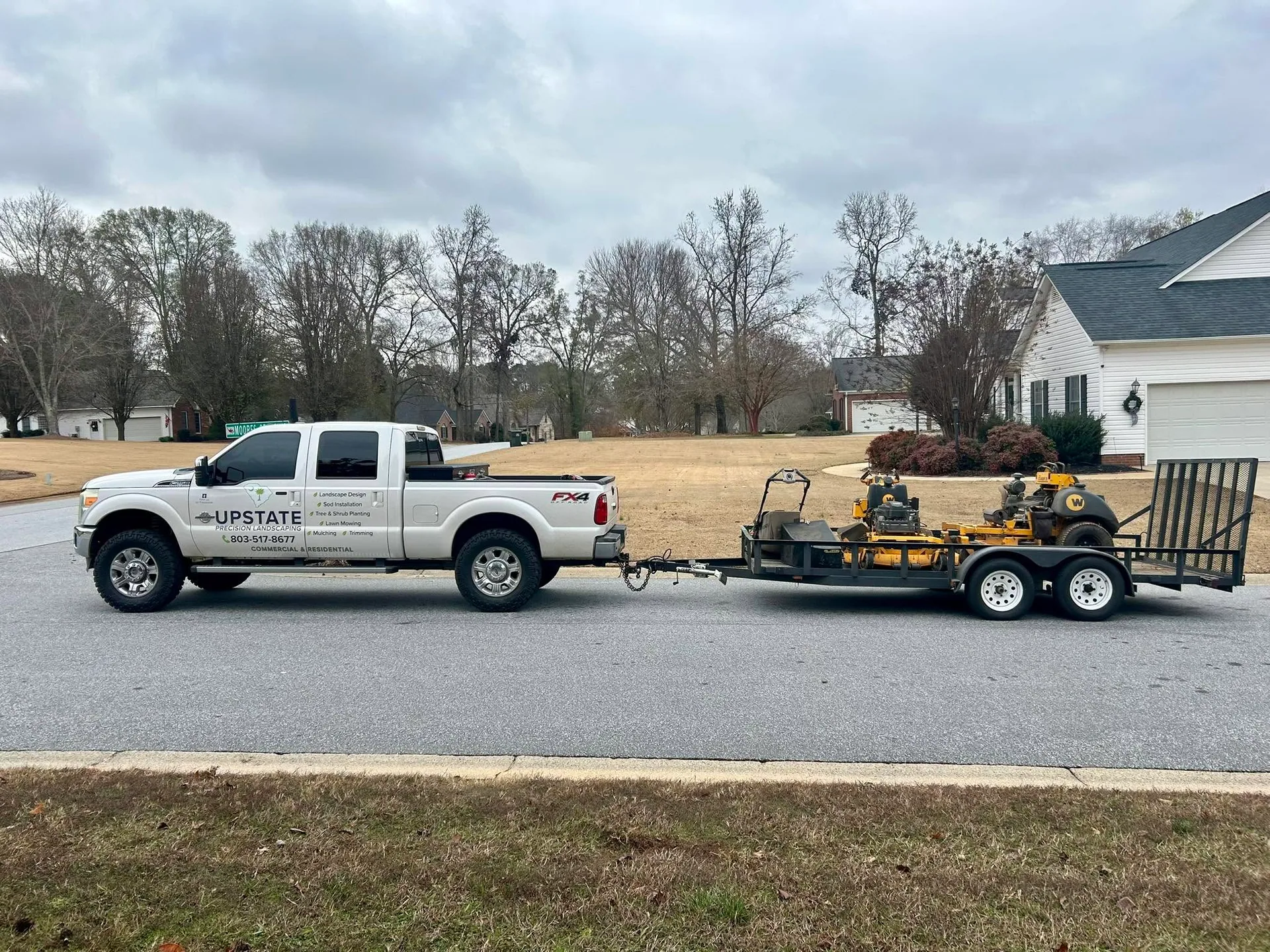 Upstate precision landscaping lettered truck mower trailer