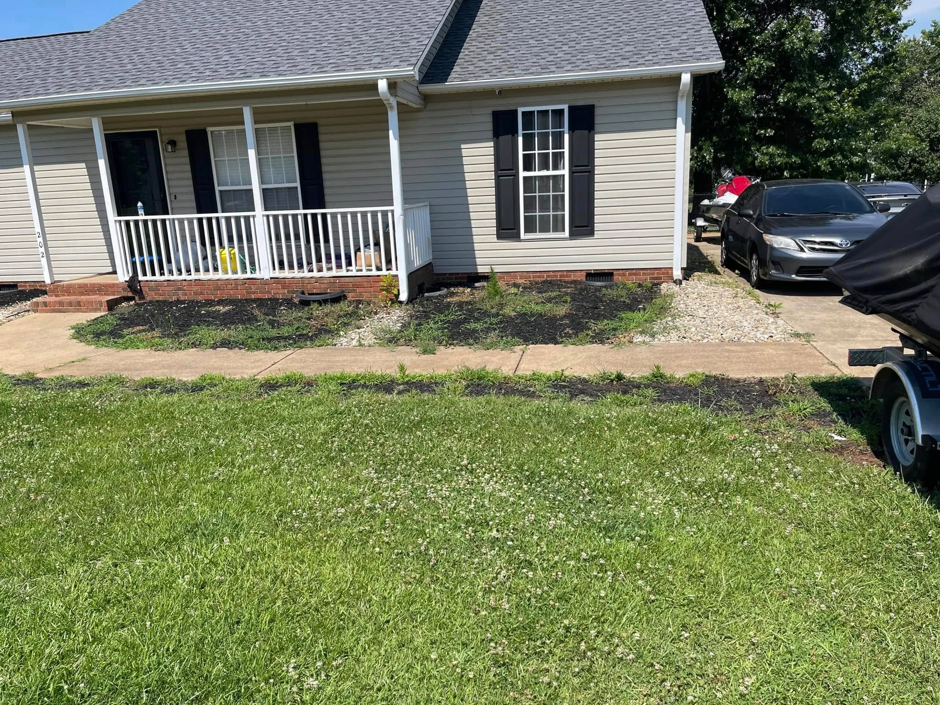 Weedy front beds clover lawn vinyl ranch