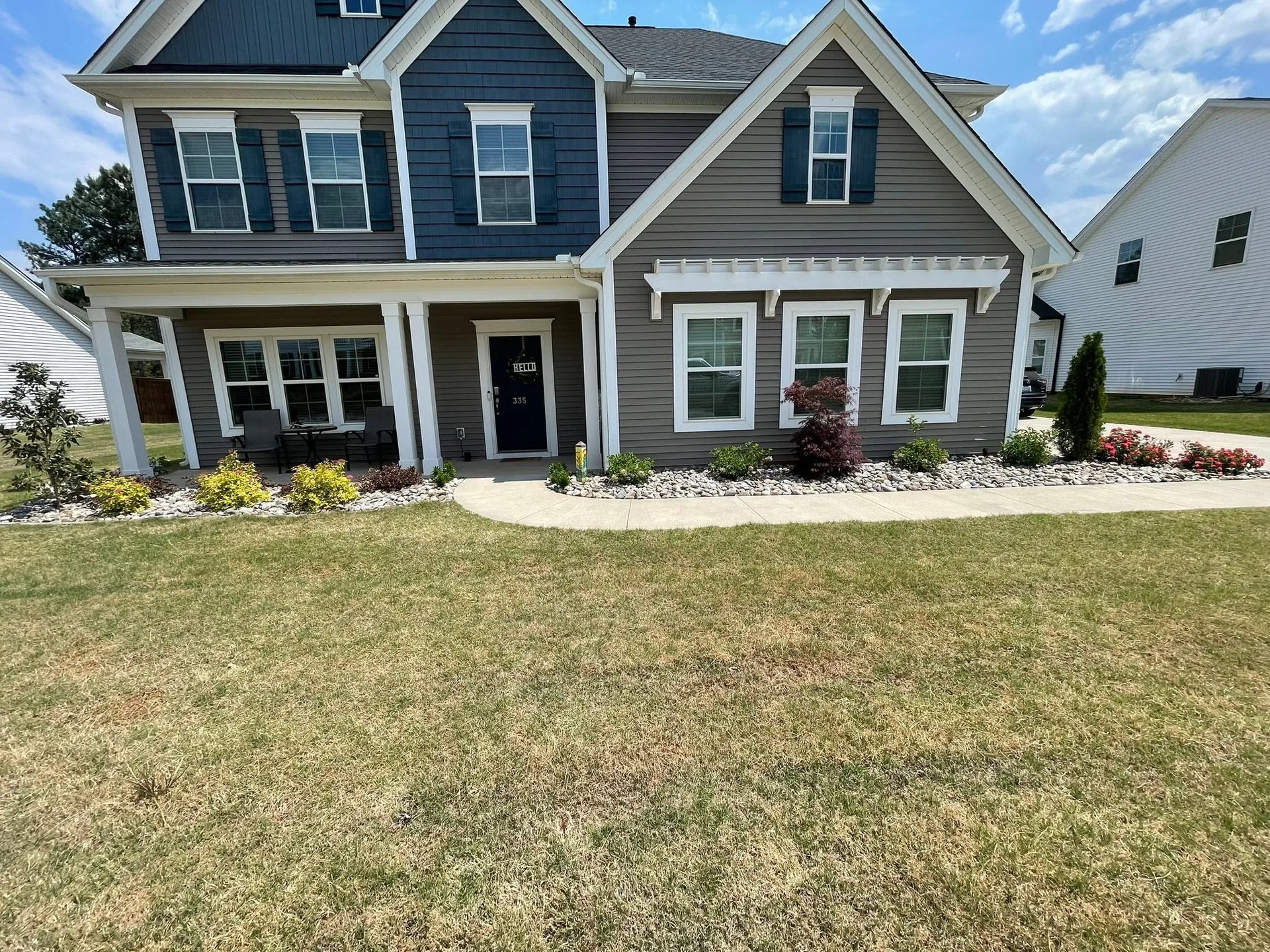 White river rock beds japanese maple front yard